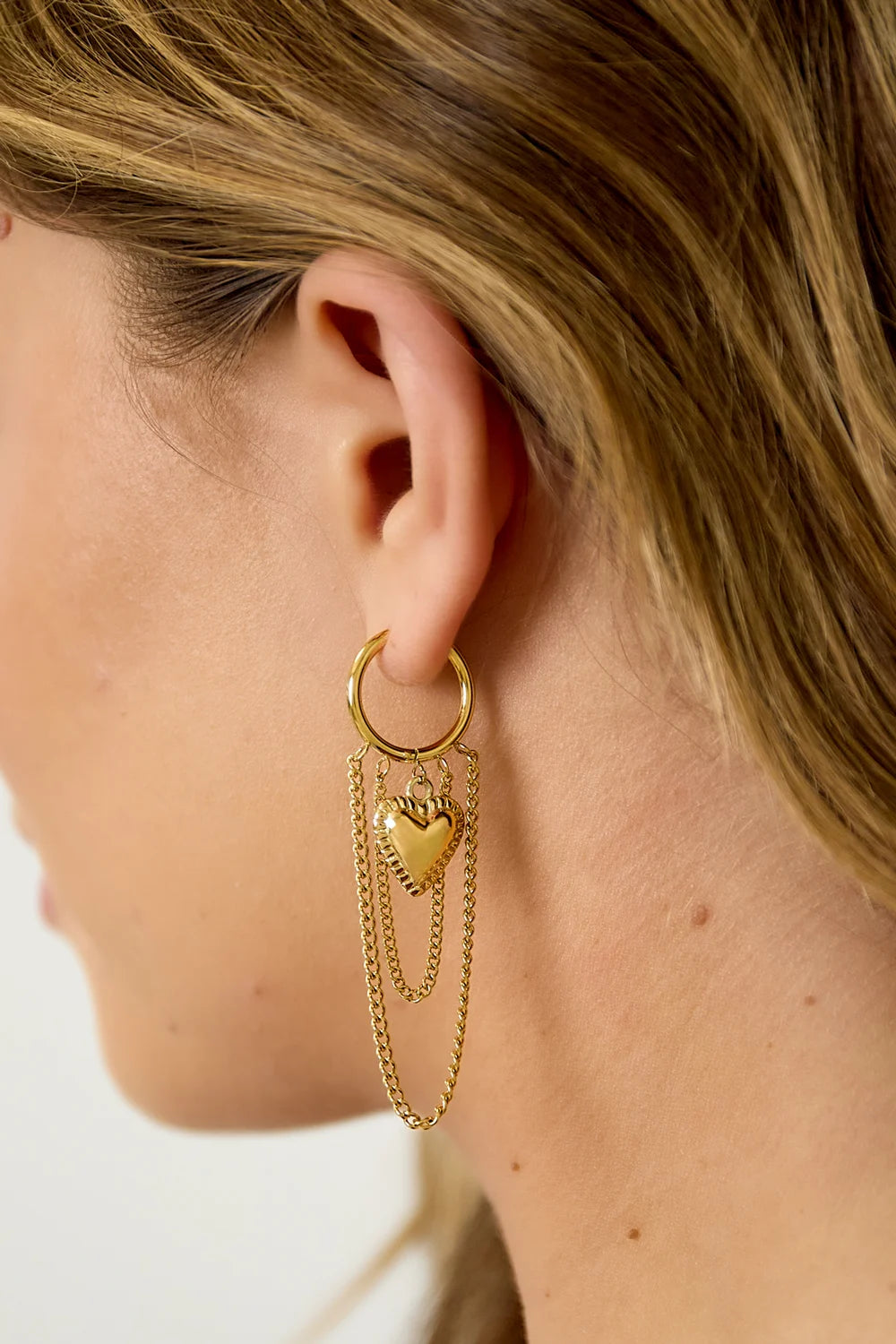 Gouden hart oorbel met ketting